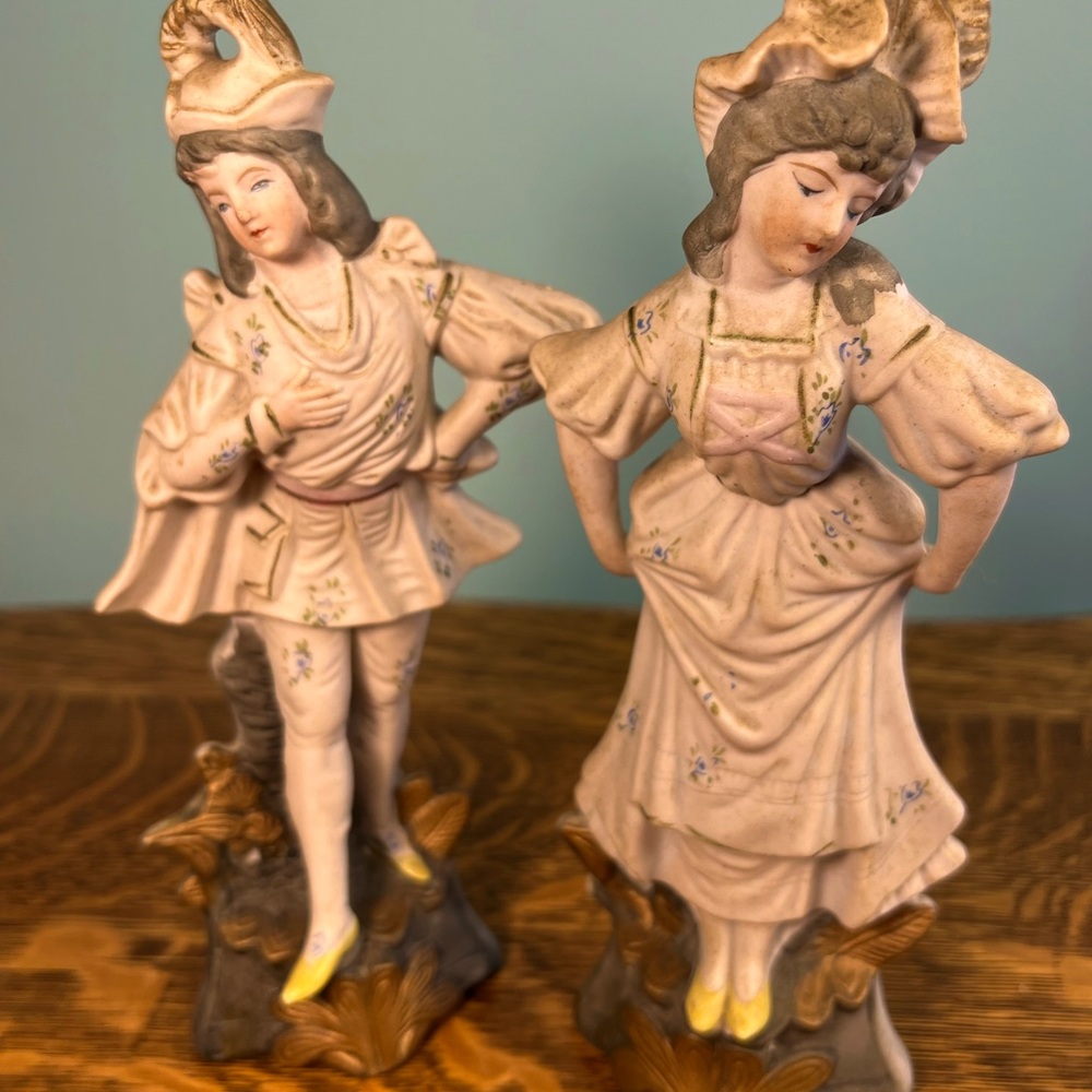 This is a set of vintage porcelain statues from Japan they are hand painted